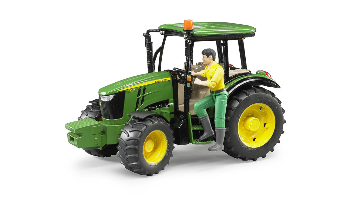 Bruder 5115M tractor with removable front weight enables flexible attachments.