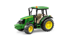 Bruder John Deere 5115M tractor side view, ideal for realistic play in tight spaces.