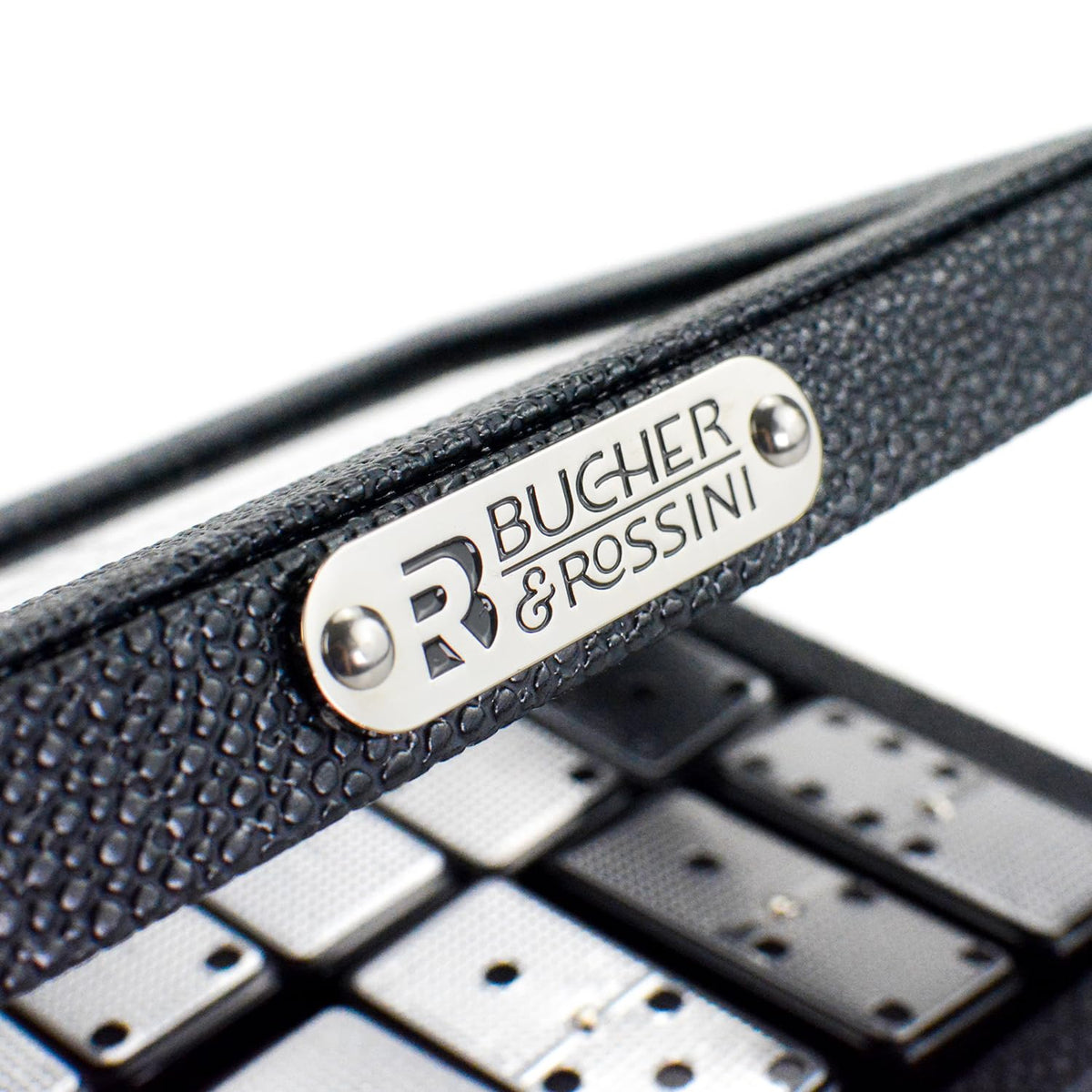 Bucher&amp;Rossini domino tiles lined up reveal silver metal surface shine