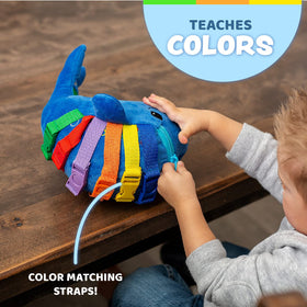 Buckle Toys Blu Whale six buckles and clasps for fine motor practice.
