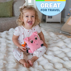 Buckle Toys Boink Pig serves as a road trip companion.