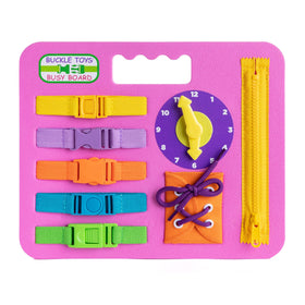Buckle Toys Busy Board pink foam base promotes fine motor exploration during play.