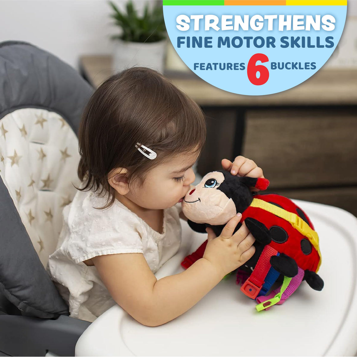 Becky Ladybug shows a zipper pouch for storage and tactile exploration.