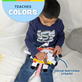 Buckle Toys Bessie Cow embroidery highlights friendly farm animals for imaginative learning.