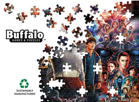 Buffalo Games detailed artwork offers colorful scenes across Stranger Things seasons.