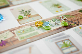 Buffalo Games Planted game board and player components support easy setup.