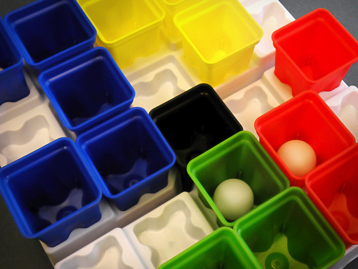 Buffalo Games PlingPong interlocking trays stabilizing the play surface