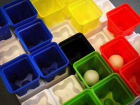 Buffalo Games PlingPong interlocking trays stabilizing the play surface