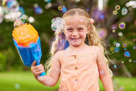 Bunch O Bubbles motorized bubble blaster party scene with abundant bubbles.