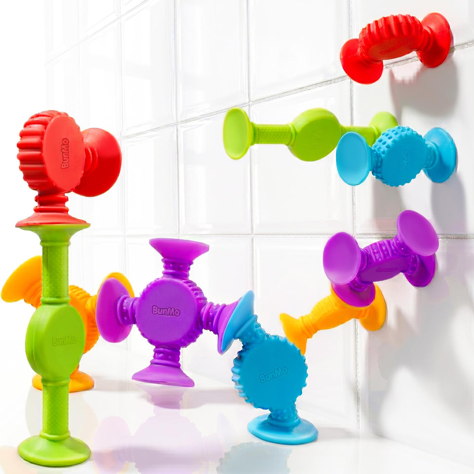 BUNMO suction bath toys show kids connecting and building colorful structures during bath time.