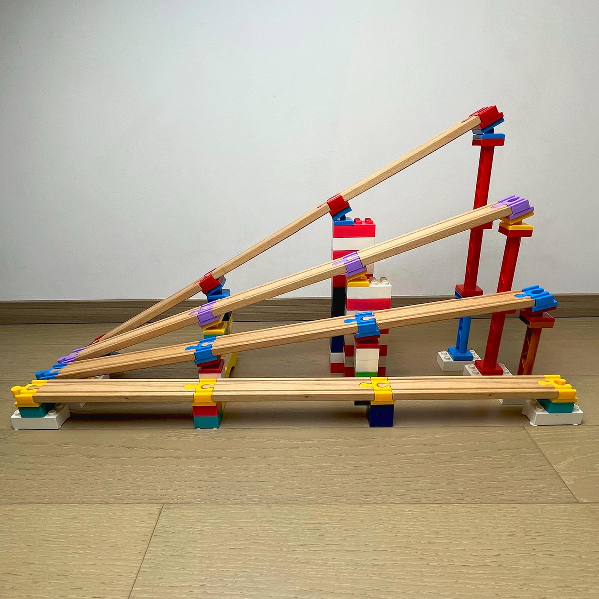 Bunu1492-create-track-city invites kids to build imaginative rail networks.