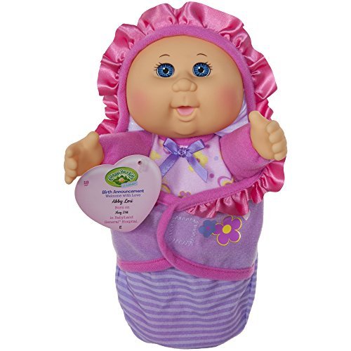 Cabbage Patch Kids Lil Swaddler blue-eyed doll for comforting playtime.