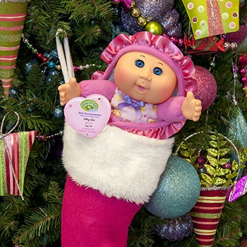 Cabbage Patch Kids Lil Swaddler thumb-sucking feature supports imaginative rituals.