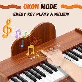 CAHAYA 37-key piano side view shows easy transport with built-in handles