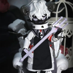 CALEMBOU horned doll showcasing accessory style for display.