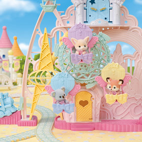 Calico Critters Baby Dream Amusement Park Flying Train promotes dynamic movement during play.