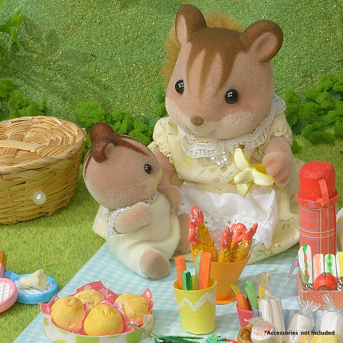 Calico Critters Hazelnut Chipmunk Sister Sarah with camera for pretend photography moments.