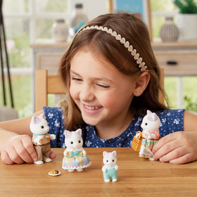 Calico Critters Latte Cat Baby Pino, cheerful shopper sparks early commerce play.