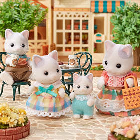 Calico Critters Latte Cat Girl Monica with outfits for pretend dressing and stories.
