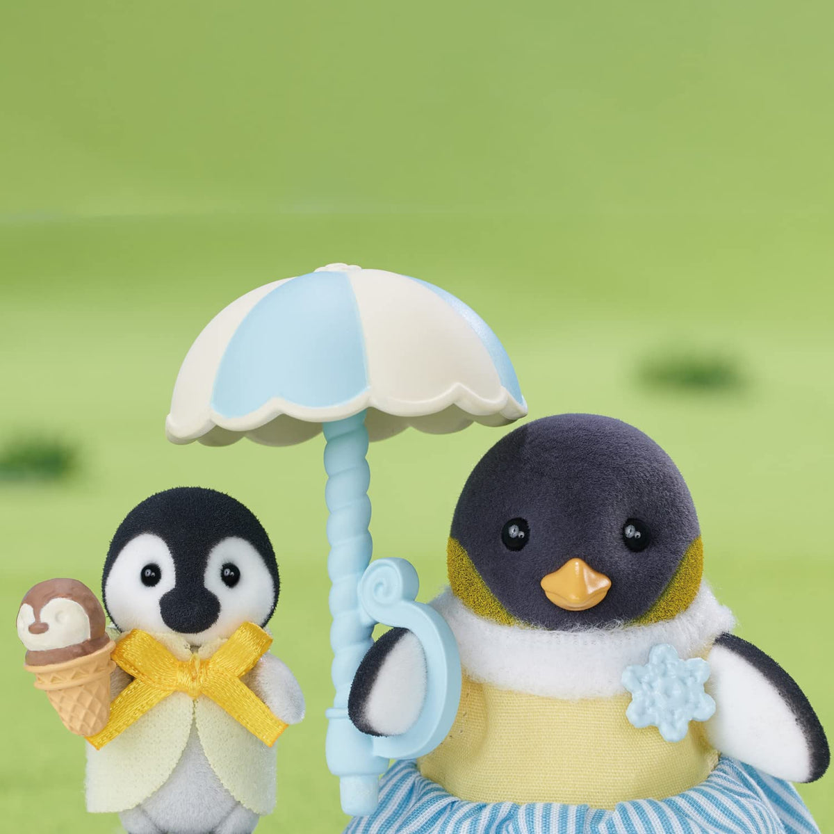 Calico Critters Sapphire mother with graceful ice-dancing pose for storytelling.