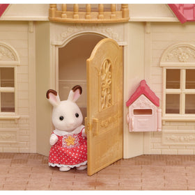 Calico Critters Red Roof Cozy Cottage bedroom set creates bedtime stories.