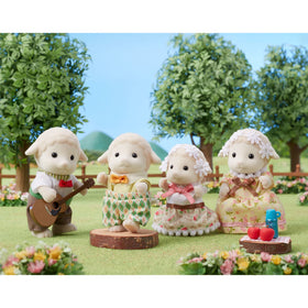 Calico Critters Sheep Family brother Winton ready for storytime and learning.