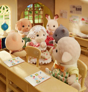Calico Critters Sheep Family poseable joints allow expressive action poses.