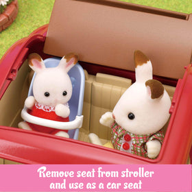 Stroller seat detaches to back of car for twin figures.
