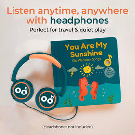 Cali's Books You Are My Sunshine lyrics visible on pages to support early language and rhythm.