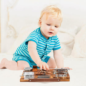 Canuan Busy Board smooth wooden surface supports safe, engaging play.