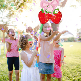 Capoda strawberry bow design creates eye-catching party decor.