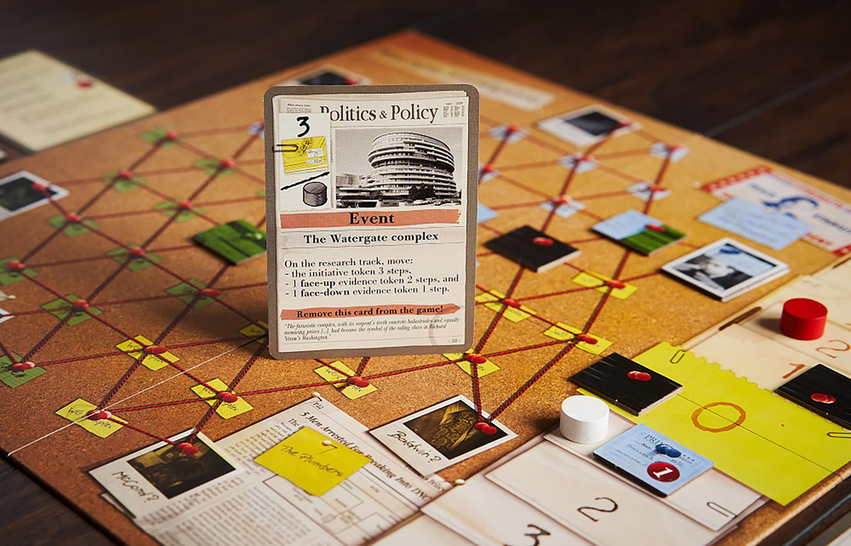 Capstone Games Watergate presentation at table with clear rules and setup guide.