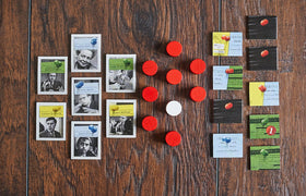 Capstone Games Watergate two players at table capturing intimate competitive atmosphere.