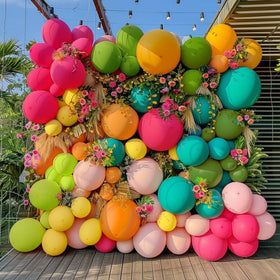 Captank pink balloons create bold color for birthdays and luaus.