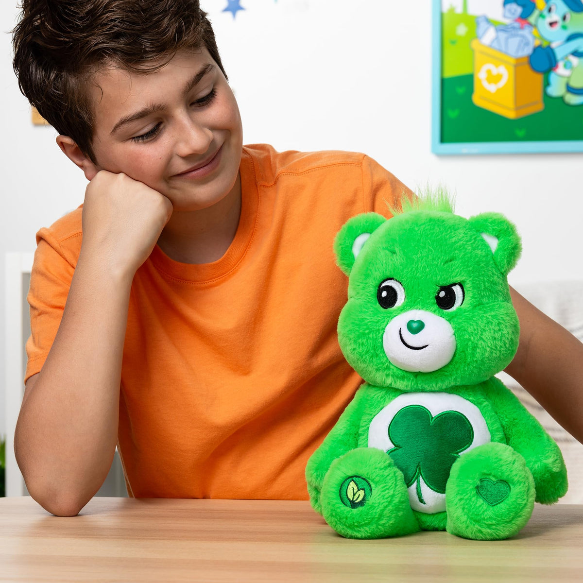 Care Bears belly badge four-leaf clover highlights luck and sharing.