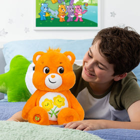Care Bears Friend Bear orange plush ideal for bedtime cuddles.