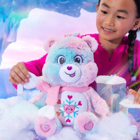 Pink knit scarf with heart details on Snowflake Sparkle Bear for cozy winter style