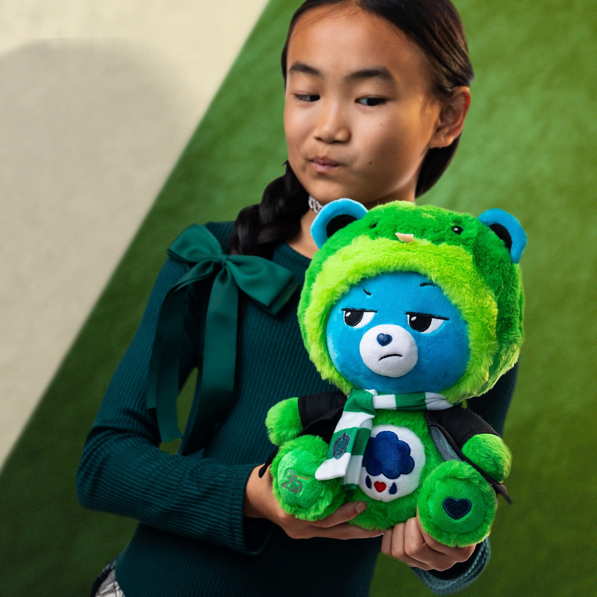 Care Bears Slytherin house scarf with crest, cozy collectible.