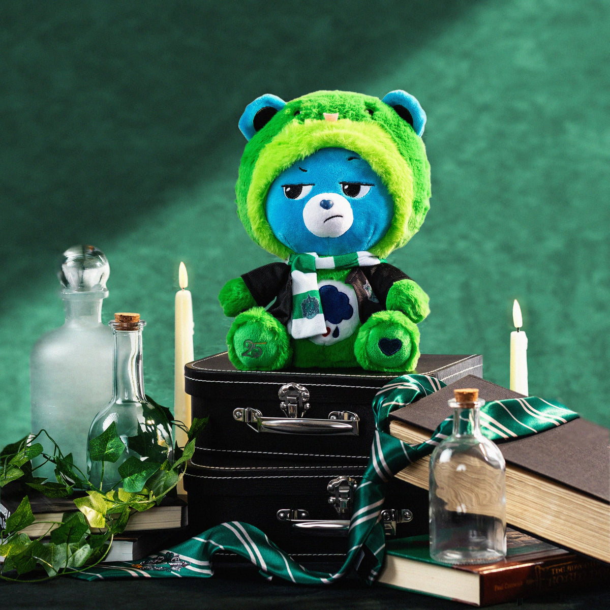 Care Bears Slytherin paw logo featuring the 25th anniversary detail.