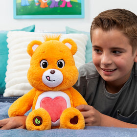 Cheerful Tenderheart Bear smile brightens playtime and bedtime stories.