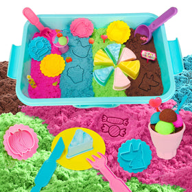 Carolart sensory bin top view with ice cream and cake kit for imaginative play.