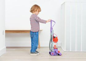Casdon Dyson DC14 toy onboard tools enable versatile pretend cleaning around furniture.