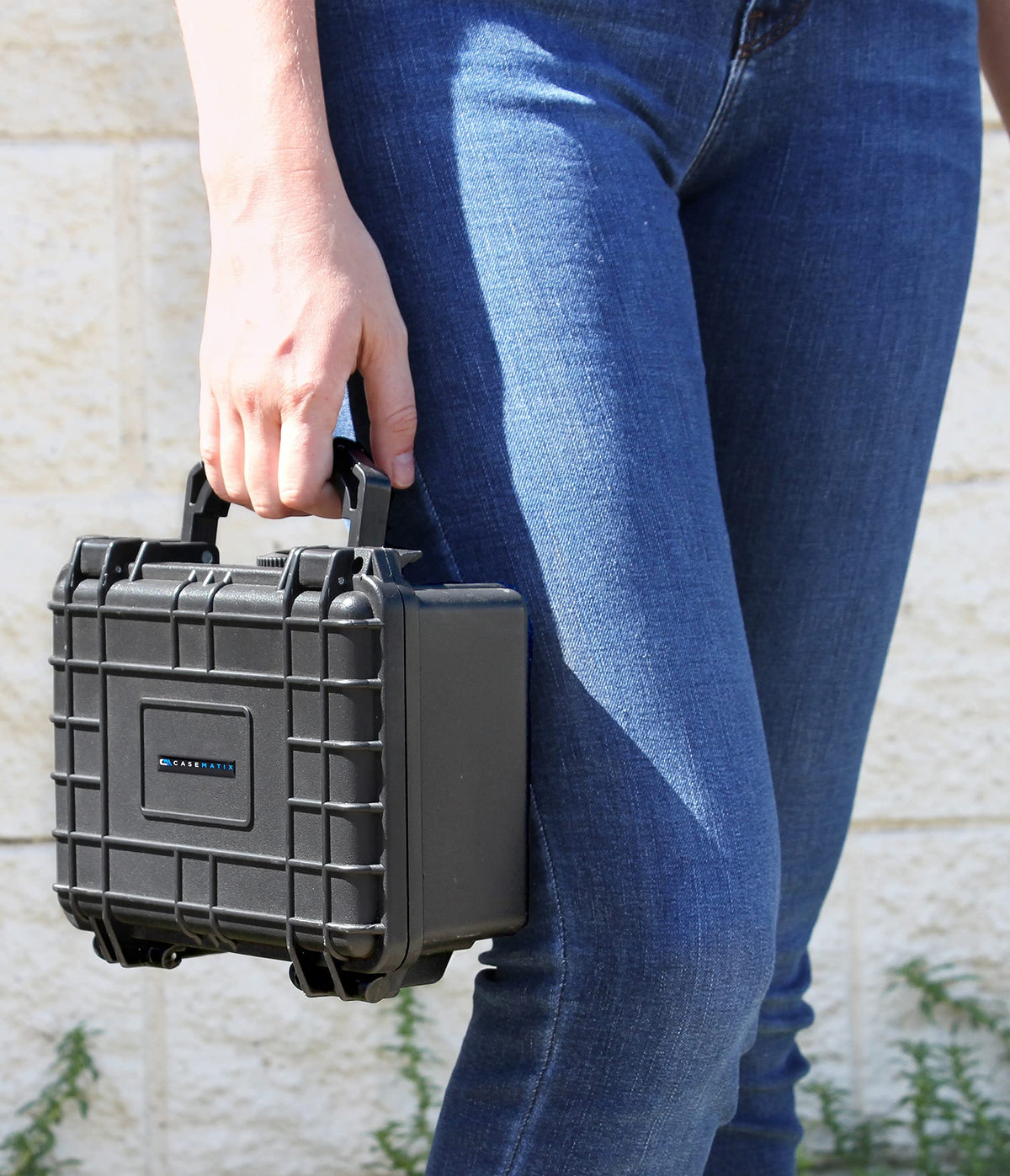 CASEMATIX graded card case held in hand for easy access on the go