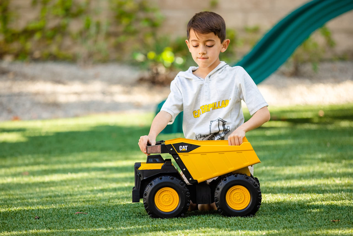 CAT Mighty Steel Dump Truck 20-inch kid-friendly design invites hands-on construction pretend play.