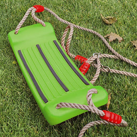 Cateam lime-green swing adds a bright accent to backyard obstacle courses.