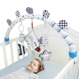 Caterbee Ocean arch pram attachment with hanging toys within reach.