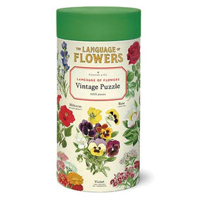 Cavallini Papers & Co language of flowers puzzle box art with vintage botanical imagery for a calming challenge.