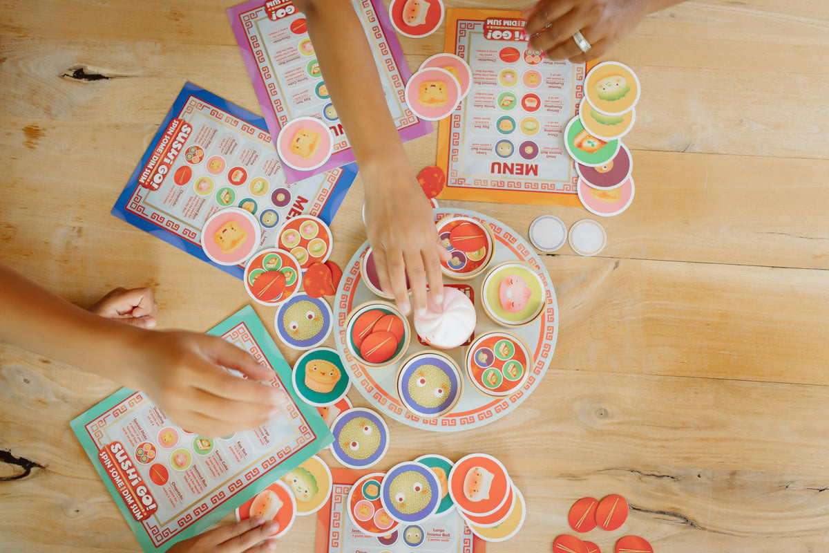 CEACO Sushi Go Spin Some for Dim Sum artwork on box and components
