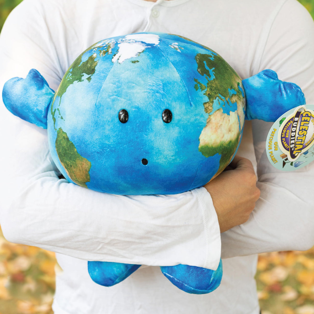 Climate change tag visible on Celestial Buddies plush with kid-friendly learning cue.