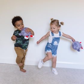Celestial Buddies Mercury Buddy embroidery detail adds charm during story time.